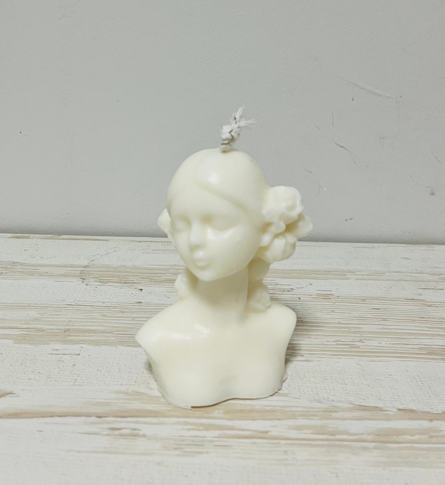 Vela busto mujer